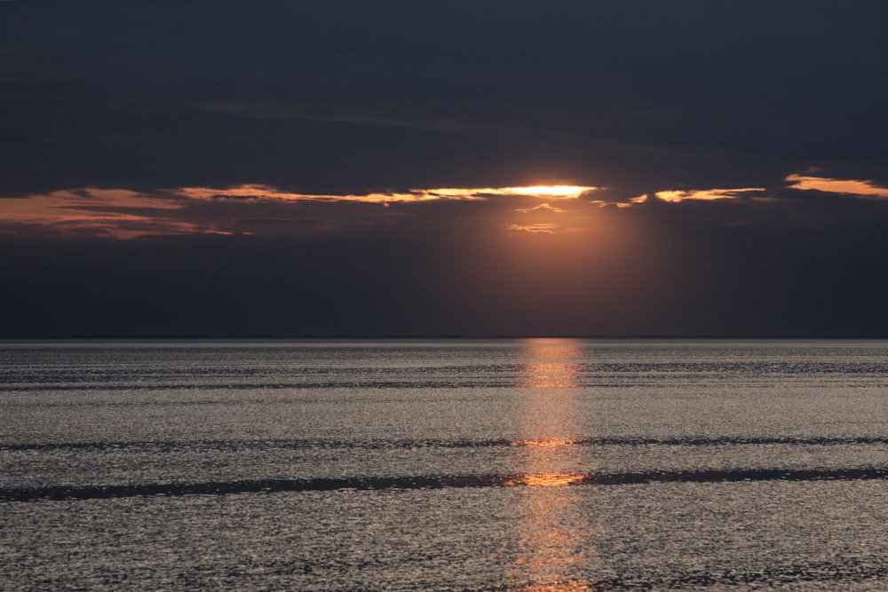 sunlight reflecting on body of water