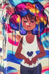 woman with colored hair painted wall
