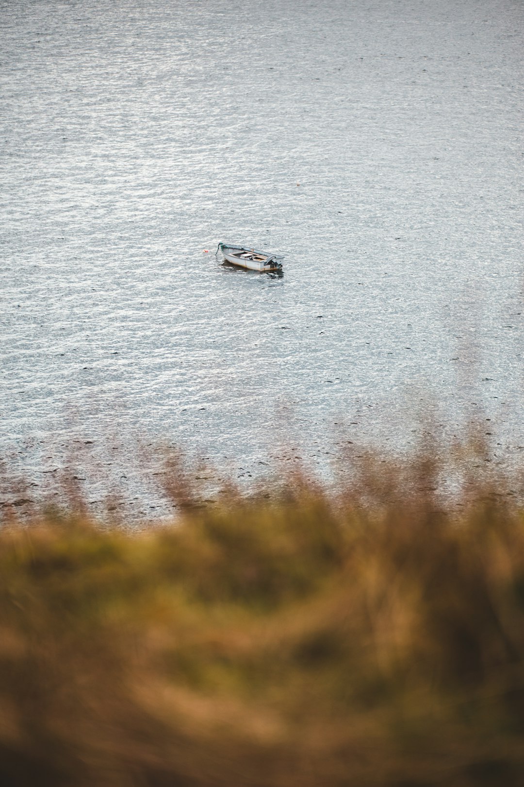 dinghy boat on body of water