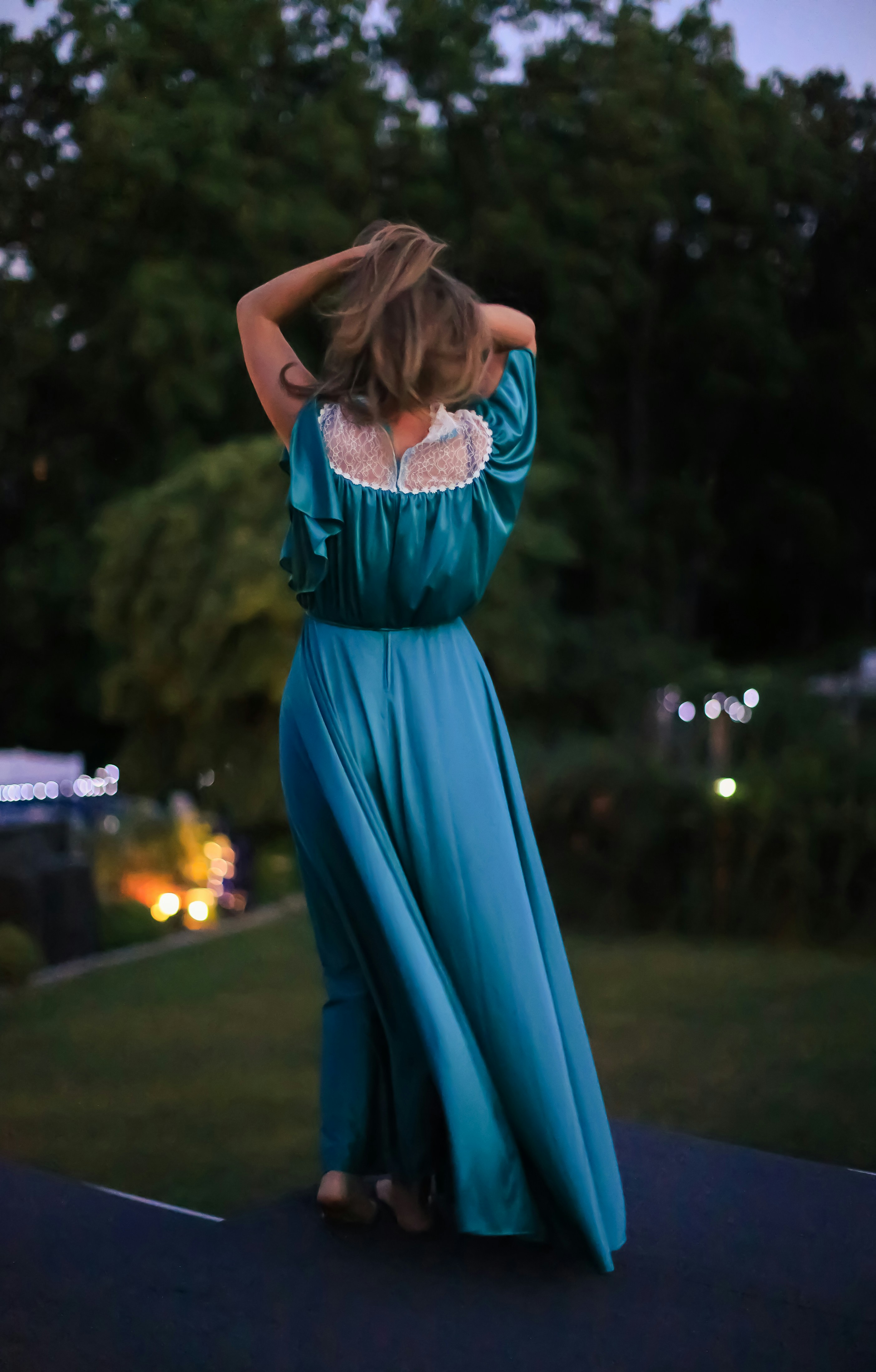 Woman Tying Her Hair Up Photo Free Apparel Image On Unsplash