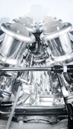 Close-up of a high-performance engine part with black and chrome finish