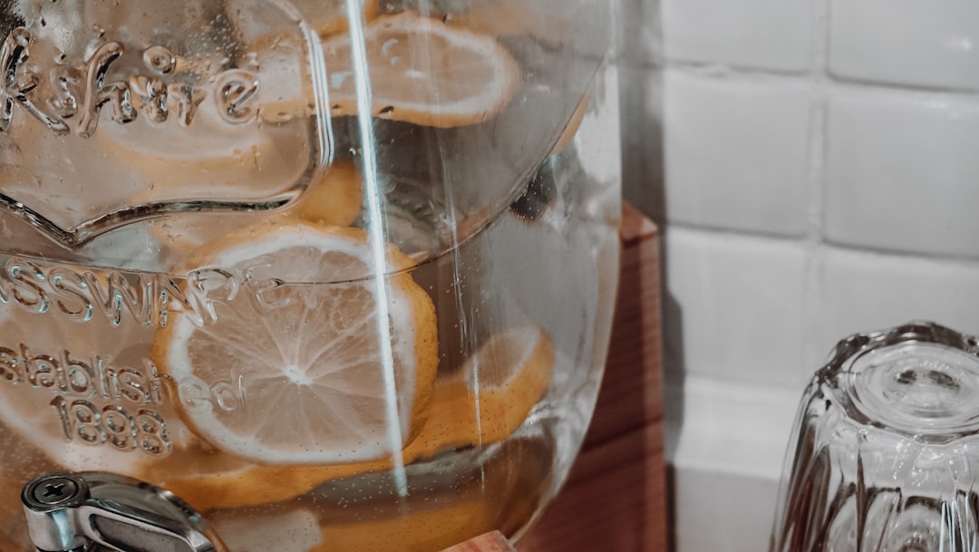 citrus juice on clear glass container