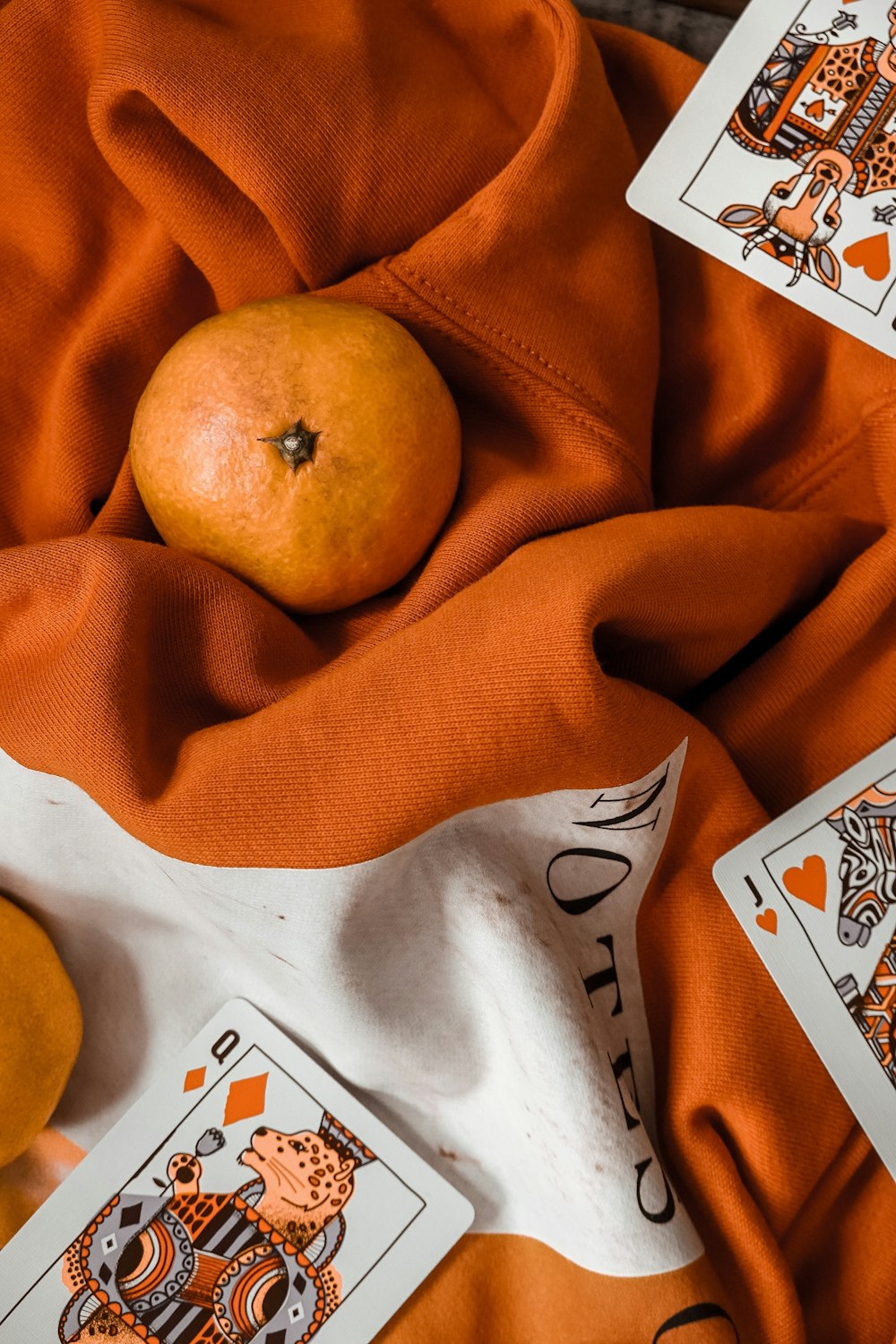 orange fruit on orange linen