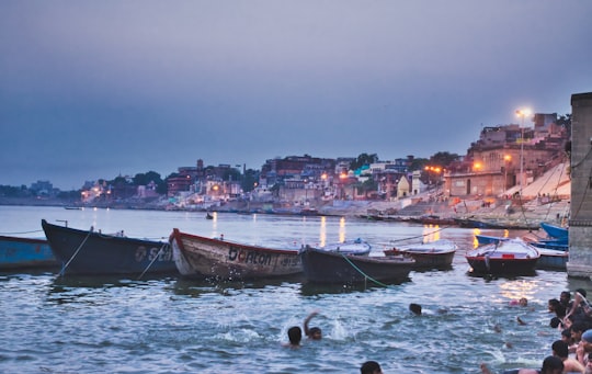 rowing boats near dock in Varanasi India