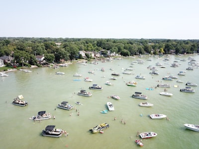 white boats on body of water at daytime michigan google meet background