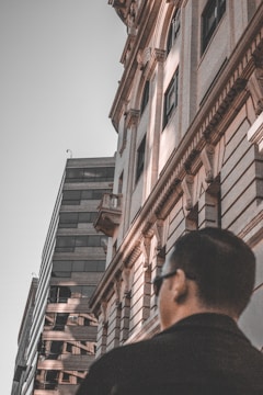 Close-up of architect examining structural details in a new building.