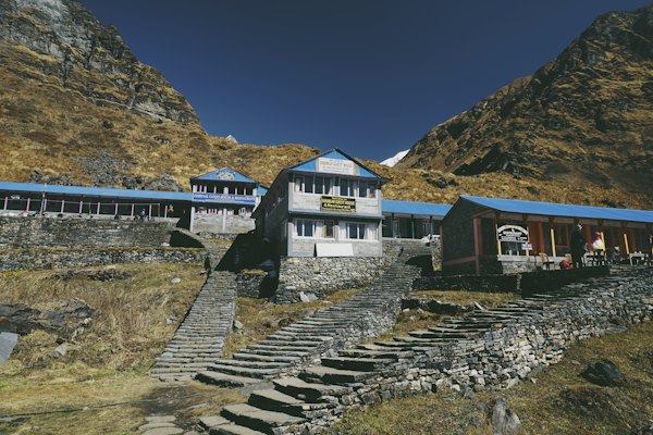 Brown and white house near body of water — Kathmandu & Pokhara, Nepal