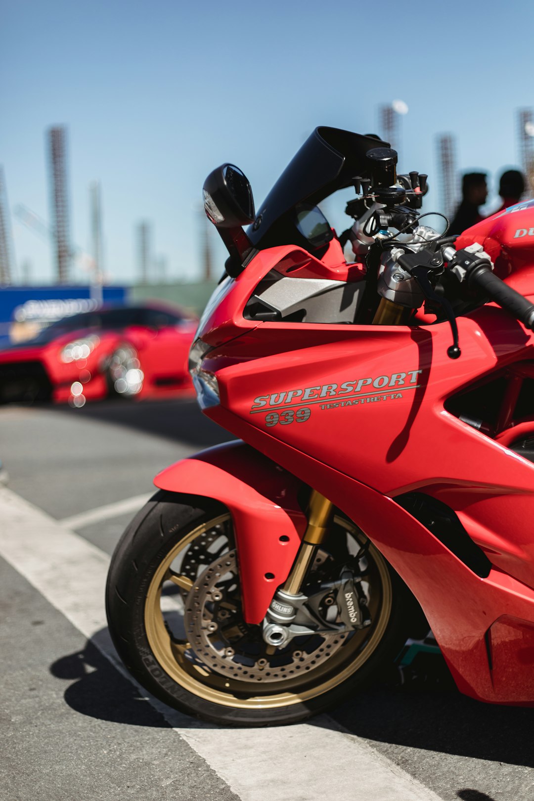 red and black sports bike