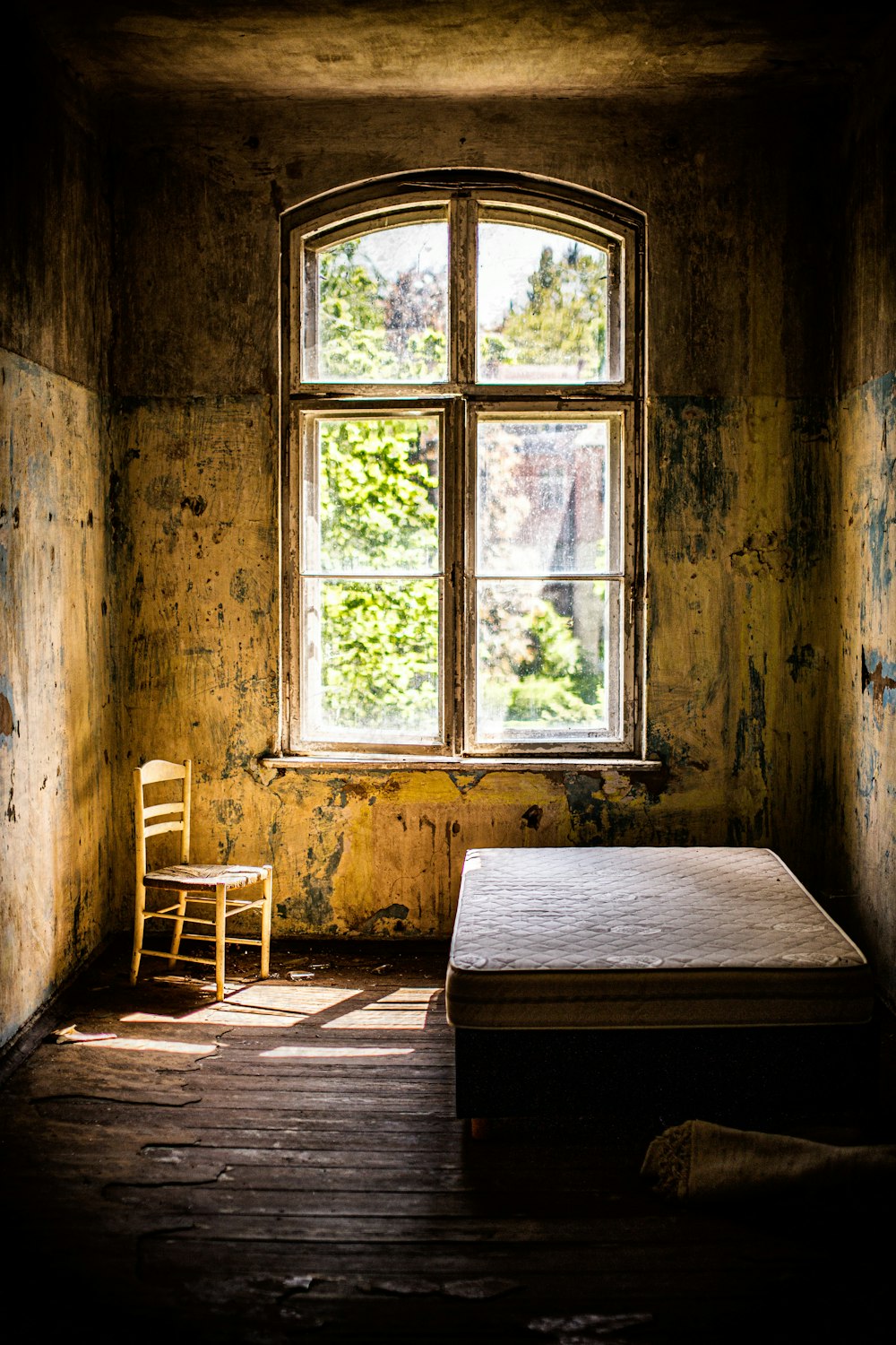 closed brown wood-framed glass window