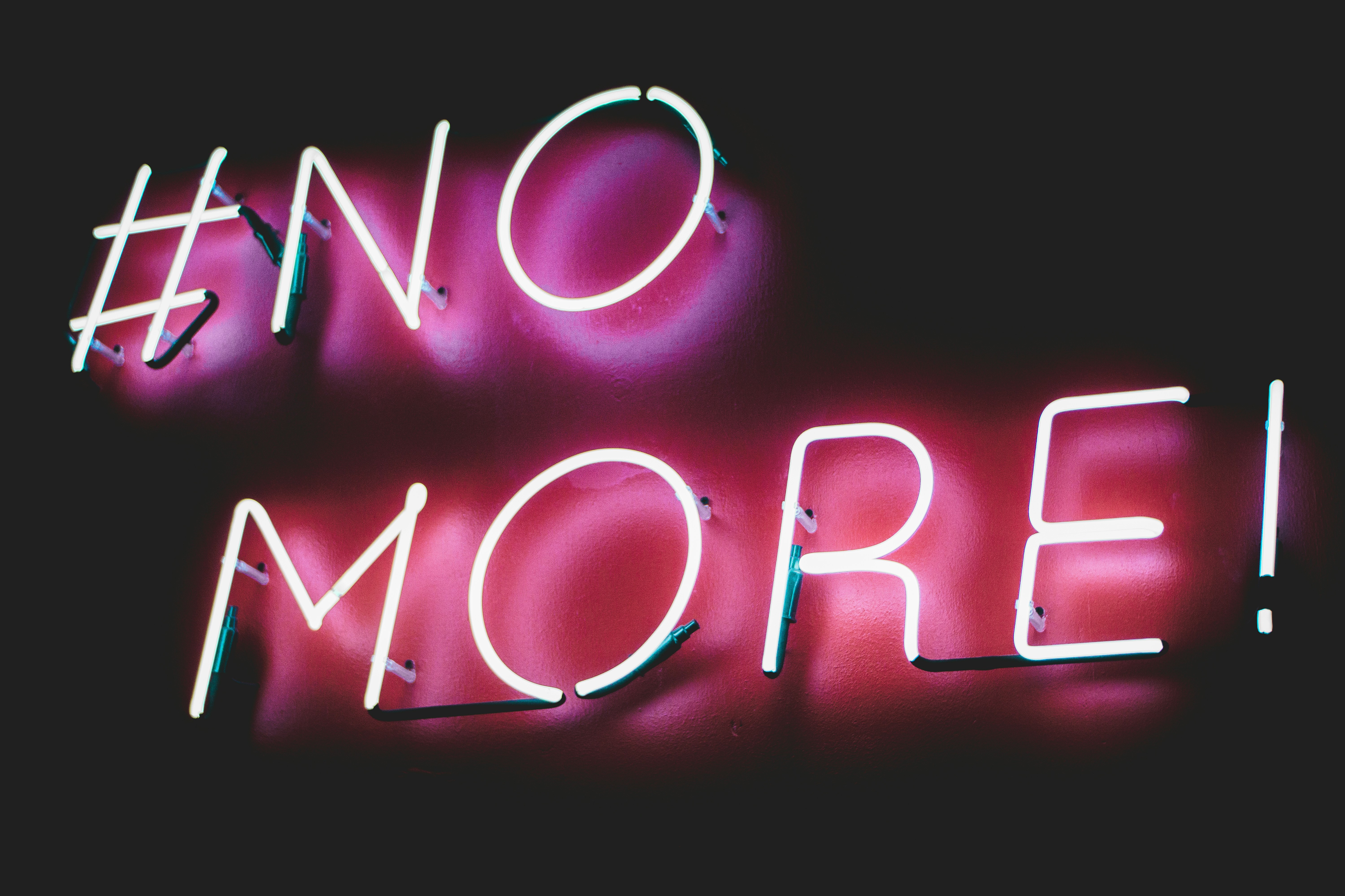 Statement minimalism neon typography on wall