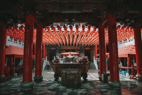 red and grey pagoda temple in Kaohsiung City Taiwan