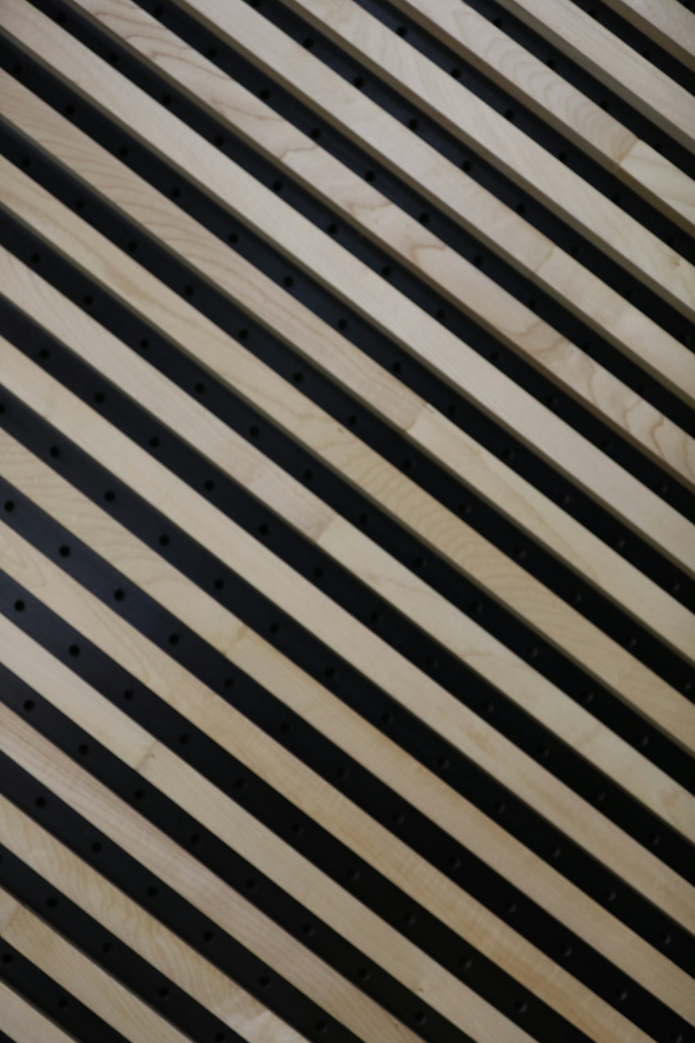 a cell phone sitting on top of a wooden table