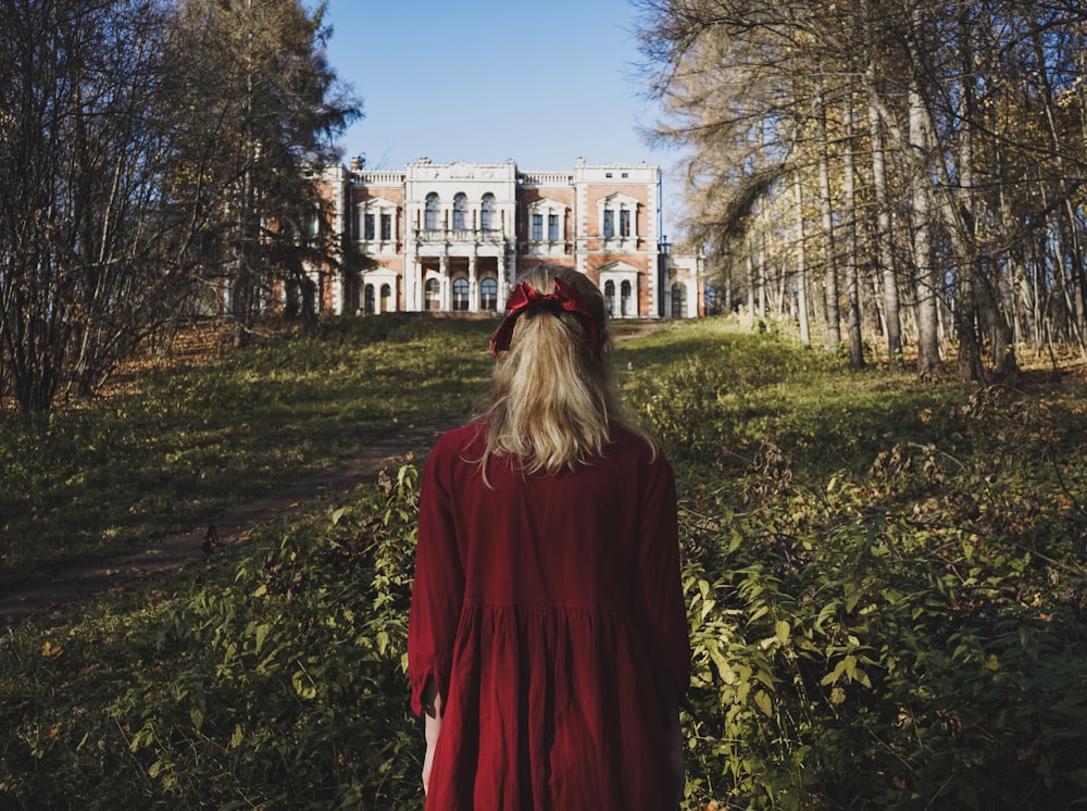 woman wears red cardigan