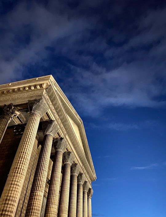 low angle photo of building in Place de la Madeleine France