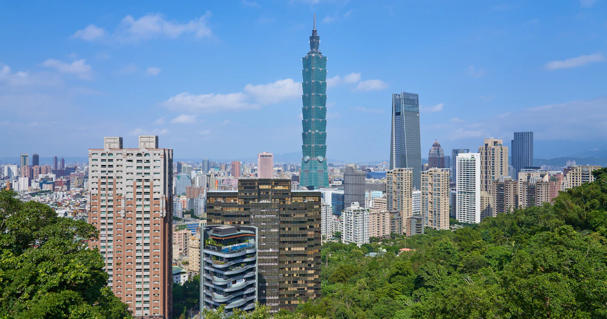 Taiwan creative workspace with design tools, music production setup, and media creation equipment