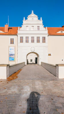 A wide-angle photo capturing the entrance of a local building.