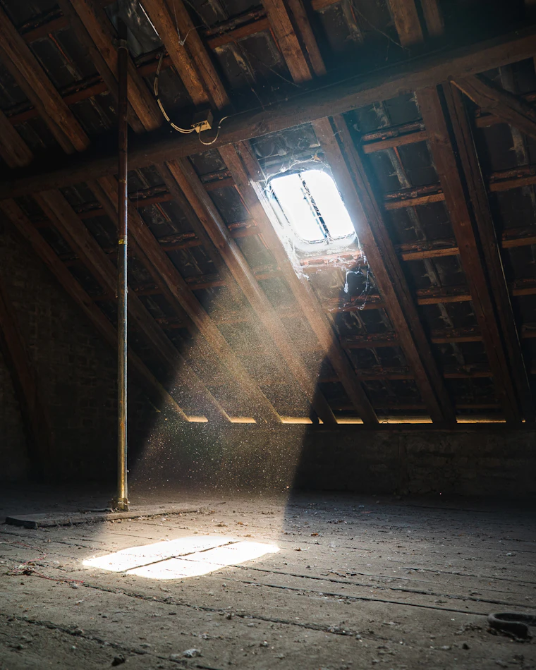 Sunlight entering the framing of a residential attic