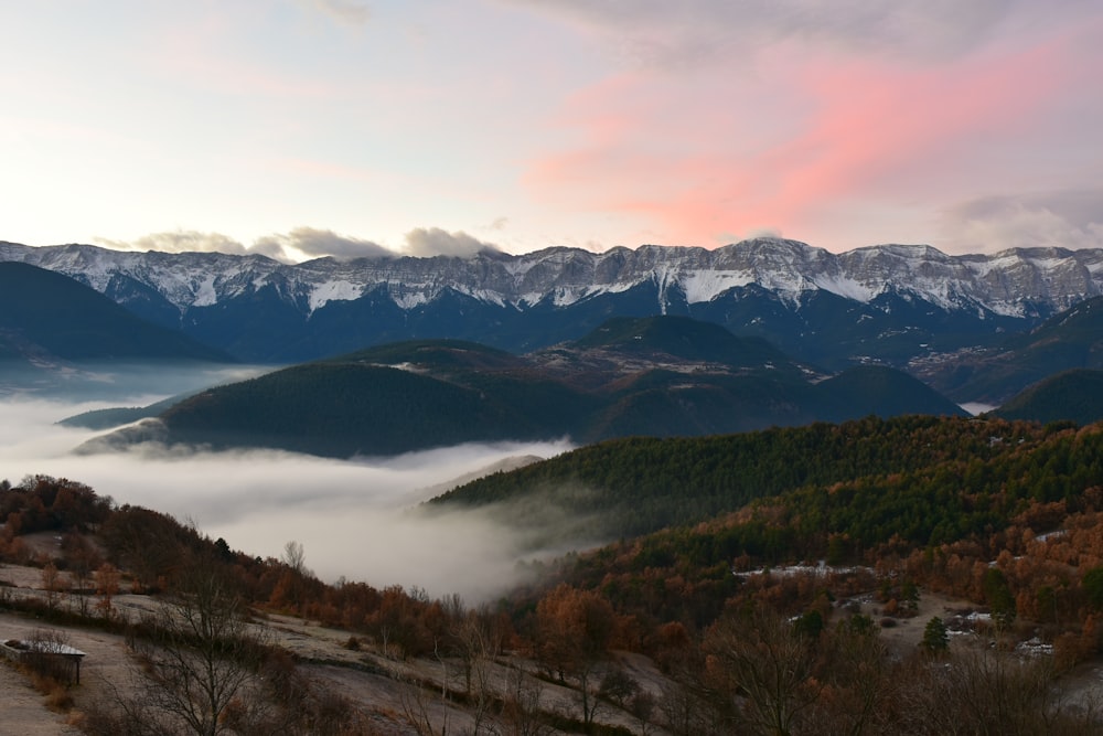 hills under grey and red sky