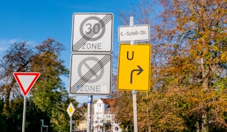 zone and u-turn road signs