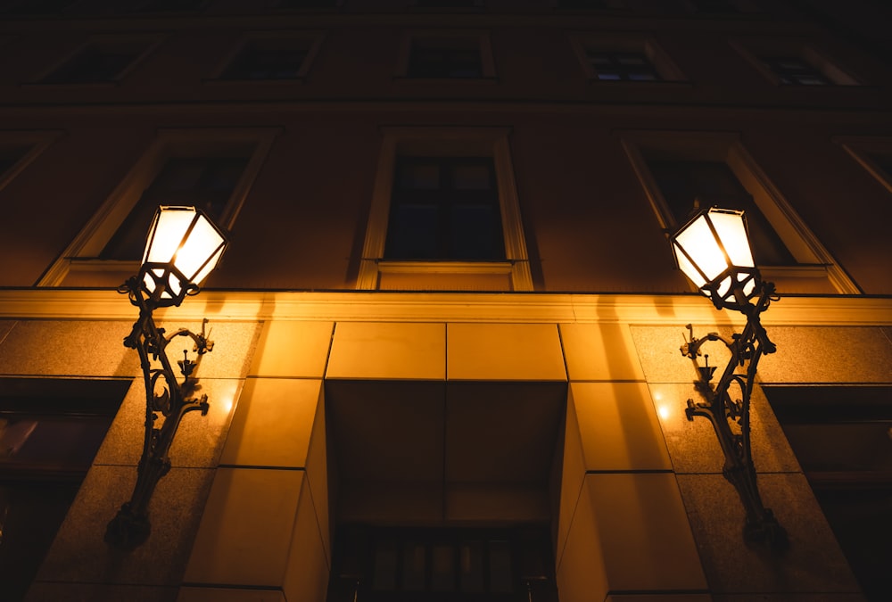 two lamps on building