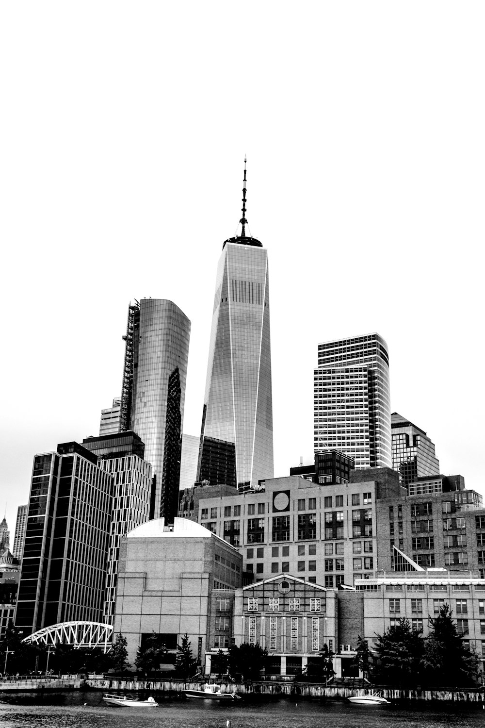 grayscale photo of city buildings