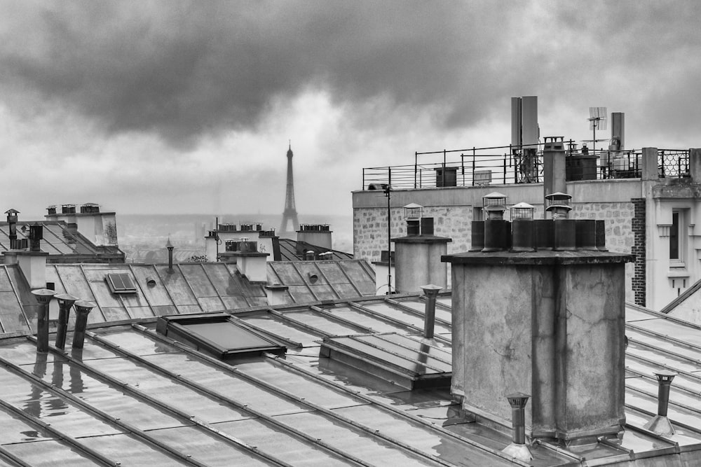 grayscale photo of rooftops