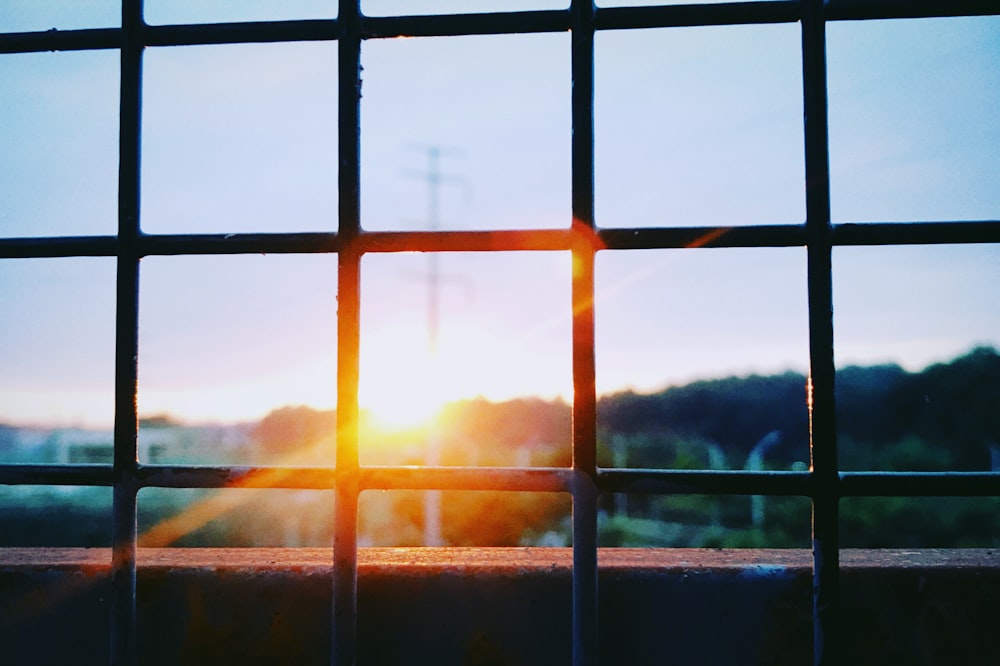 sun rays coming through glass window