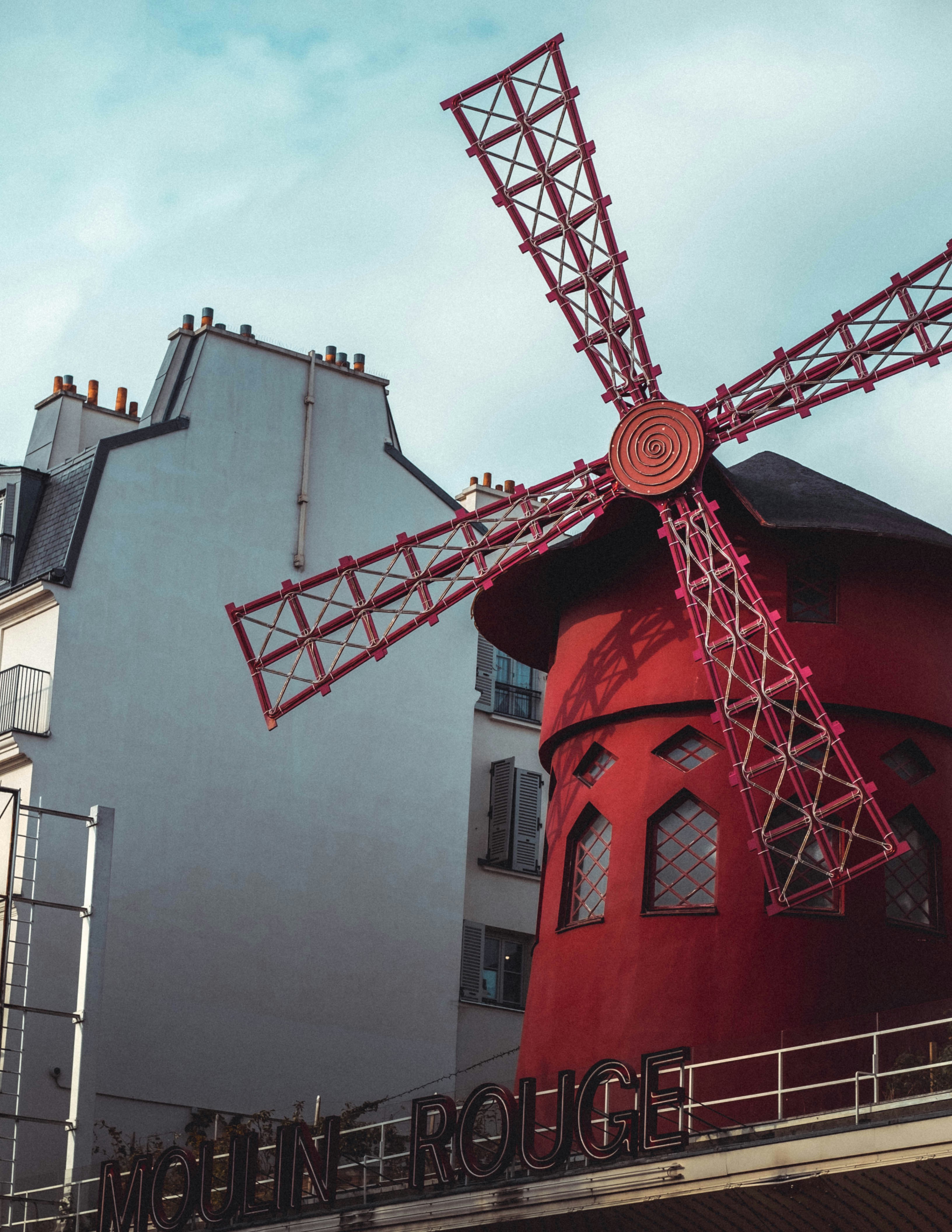 red windmill during daytime