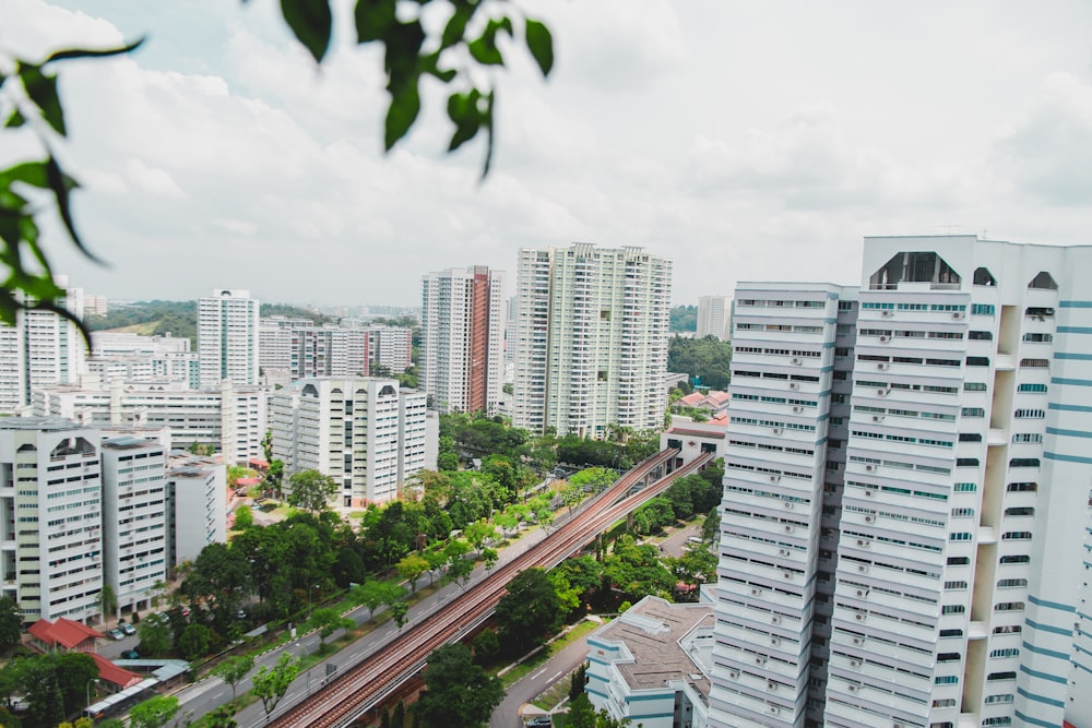 aerial photo of buildings under cloudy sky