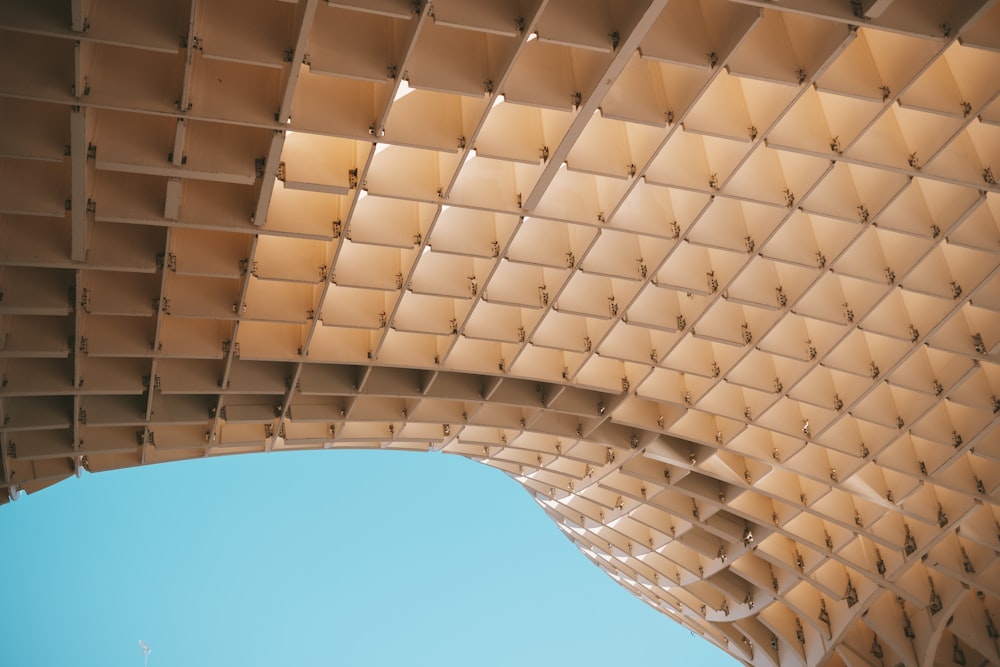 a view of the ceiling of a building from below