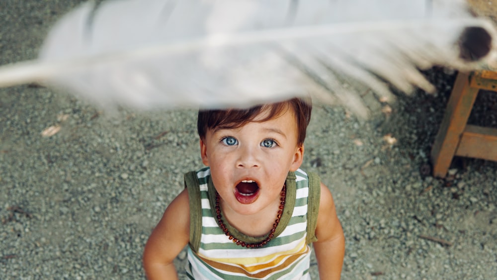 boy wearing tank top