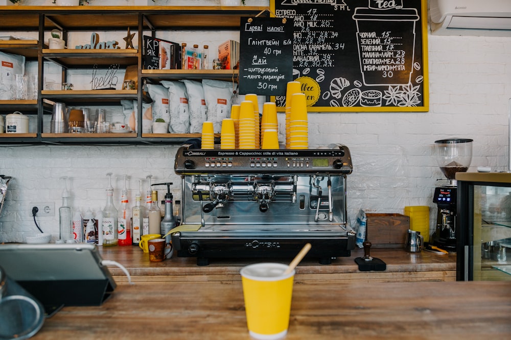 yellow cups on nespresso machine