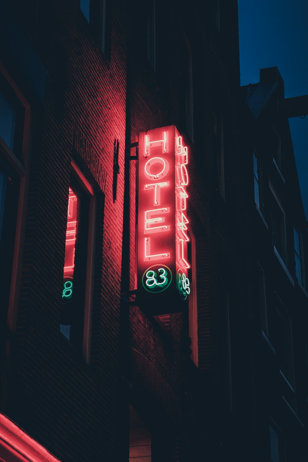lighted hotel 83 neon signage