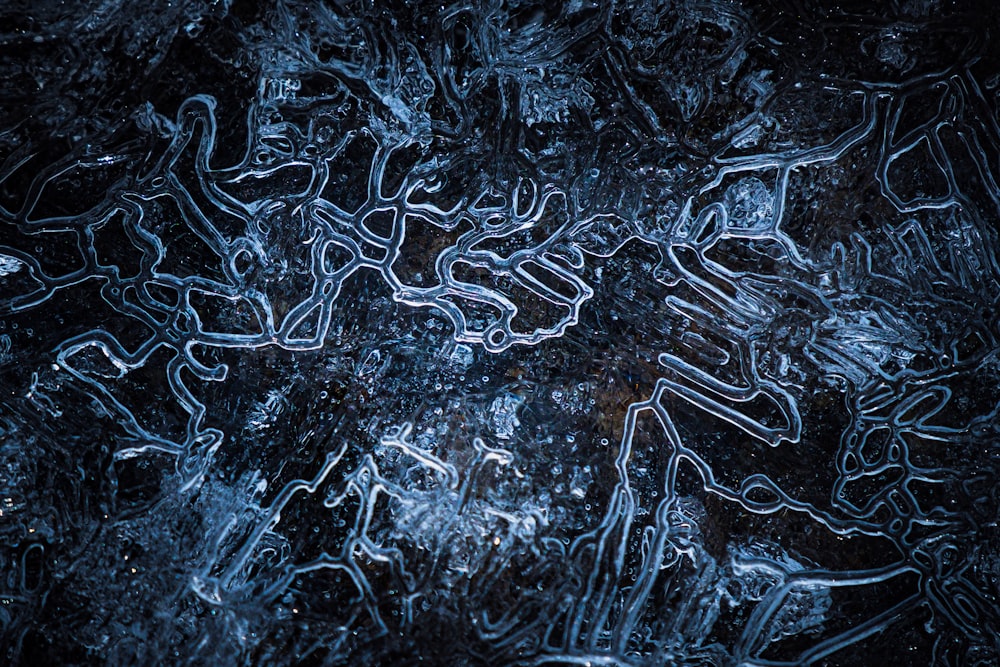 a close up of ice on a window pane