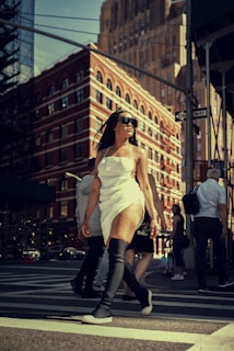 woman walking on pedestrian lane