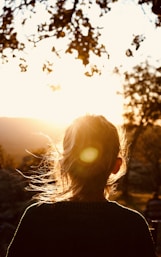 woman under orange sky