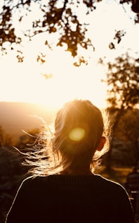 woman under orange sky