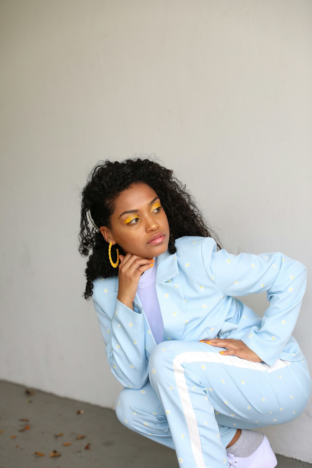 woman in white suit jacket