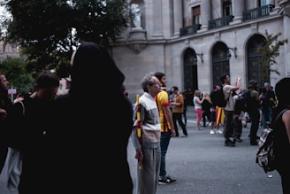 A photo capturing a group of visitors engaging with embassy staff during an open house day.