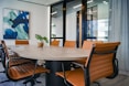 brown wooden 9-piece office table and chairs