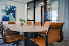 brown wooden 9-piece office table and chairs