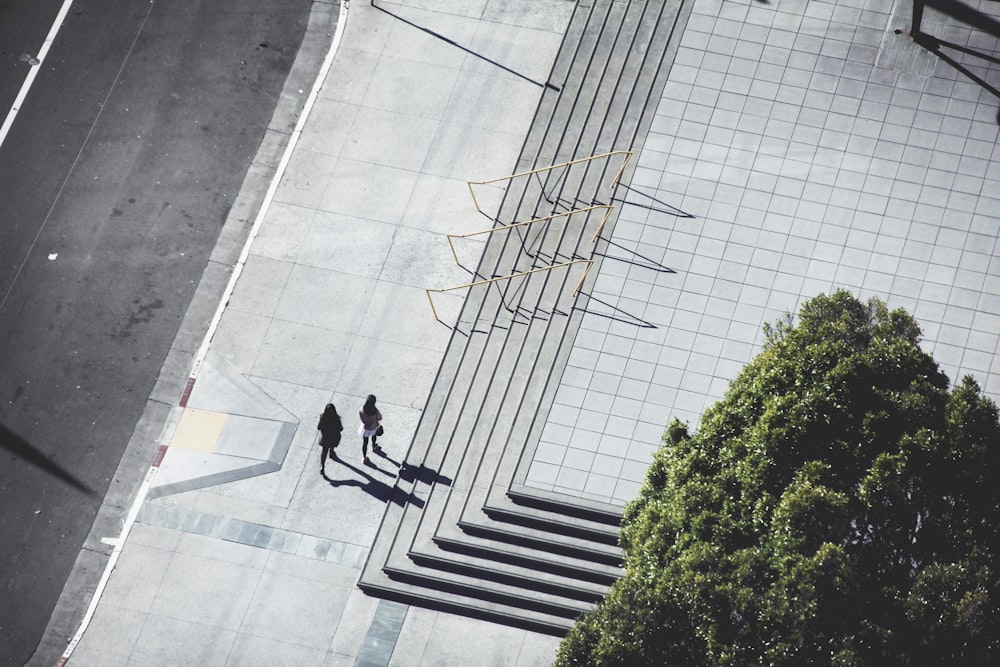 women walking near stairs