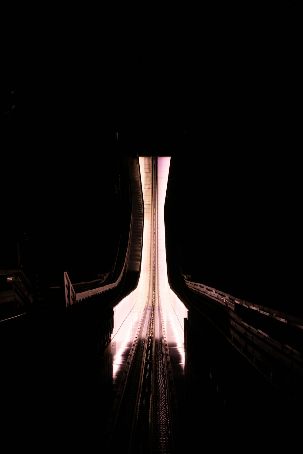 a train traveling through a tunnel in the dark