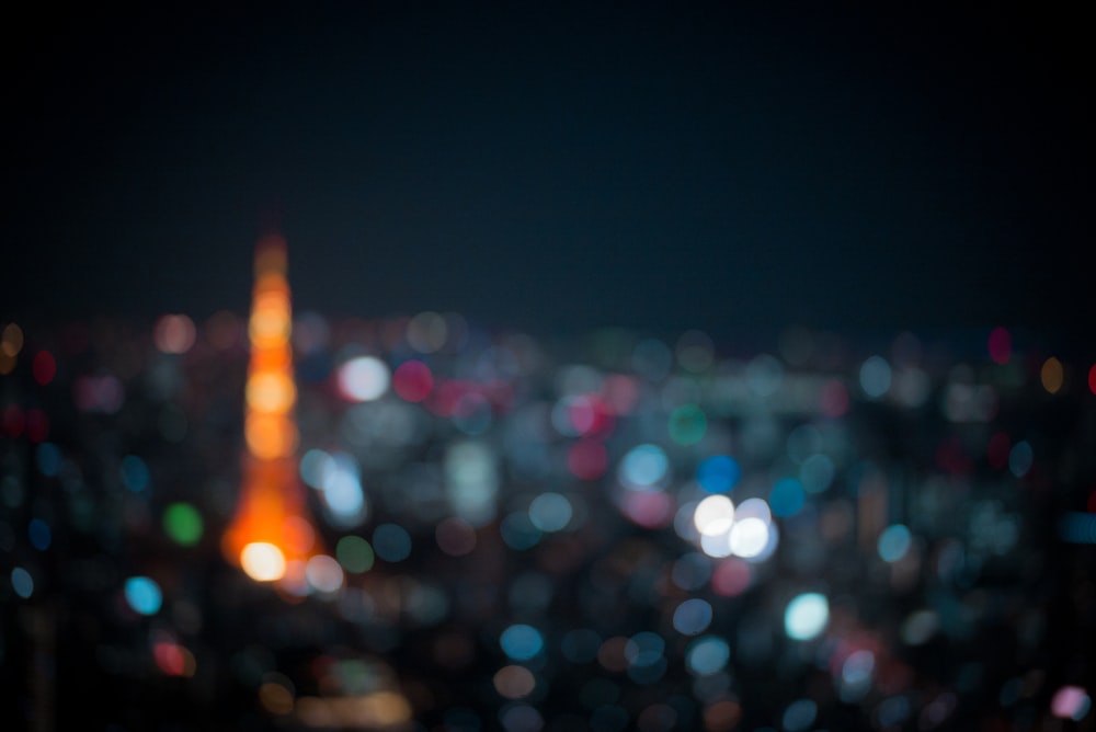 a blurry photo of a city at night