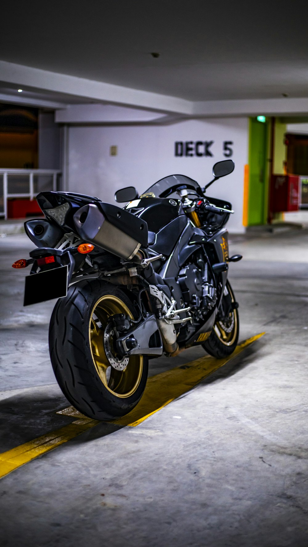 parked black sports bike