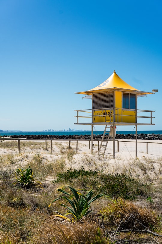 brown guard house on seashore in Coolangatta Australia