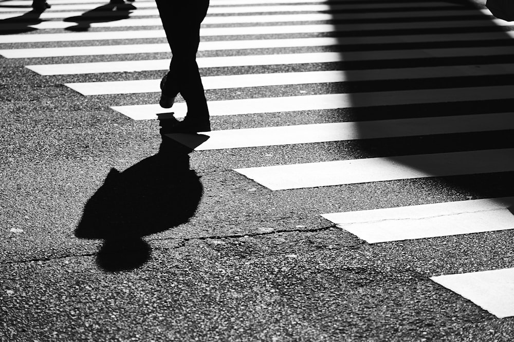 person walking on road