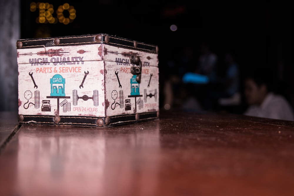 a box sitting on top of a wooden table