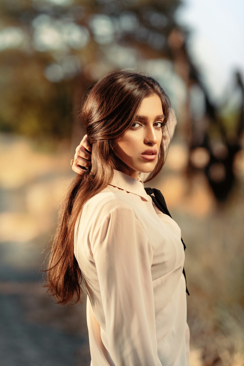 woman in white dress shirt