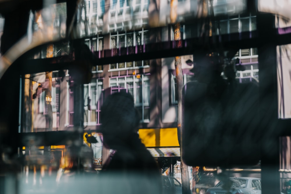 a blurry photo of a building with a person standing in front of it